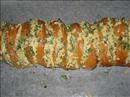 Пошаговое фото рецепта «Запеченный батон с сыром и чесноком»