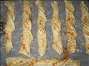 Пошаговое фото рецепта «Слоеные сырные завитки с красным перцем»