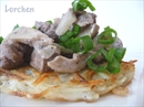 Фото-рецепт «Свинина с грибами на картофельном блине»