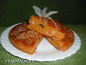 Фото рецепта «Томатный кекс с ветчиной, сыром и маслинами»