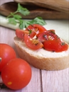 Пошаговое фото рецепта «Брускетта с чесночным маслом и помидорами черри»